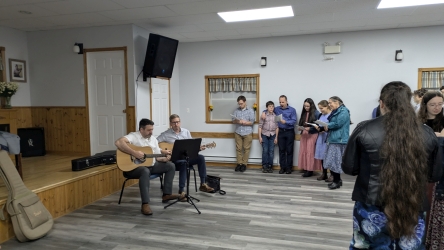 Guitarists leading the singing