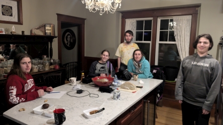 The Wilson family gathered in the kitchen