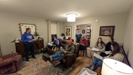Gathered around singing hymns at the McClellands'