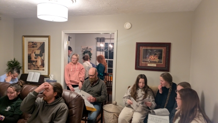 Gathered around singing hymns at the McClellands'