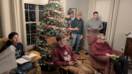 Gathered around singing hymns at the McClellands'