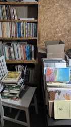 office with books waiting to go away